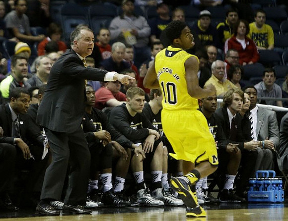Wofford Head Coach Mike Young  and Derrick Walton Jr. (10)