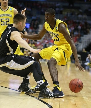 Jordan Morgan (52) and Caris LeVert (23)