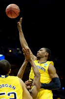 Jordan Morgan (52) and Glenn Robinson III (1)