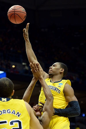 Jordan Morgan (52) and Glenn Robinson III (1)