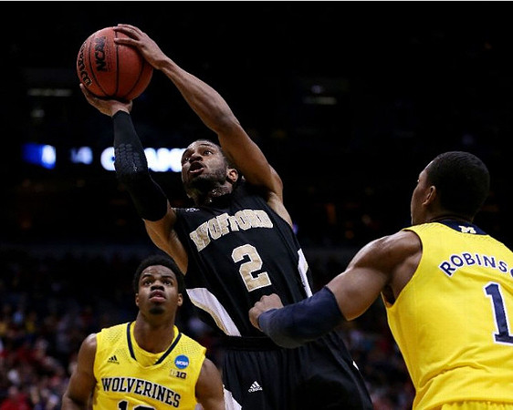 Derrick Walton Jr. (10) and Glenn Robinson III (1)
