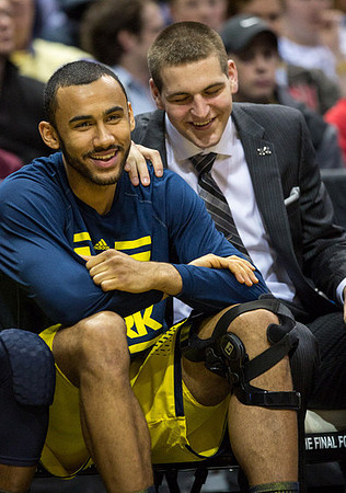 Jon Horford (15) and Mitch McGary (4)