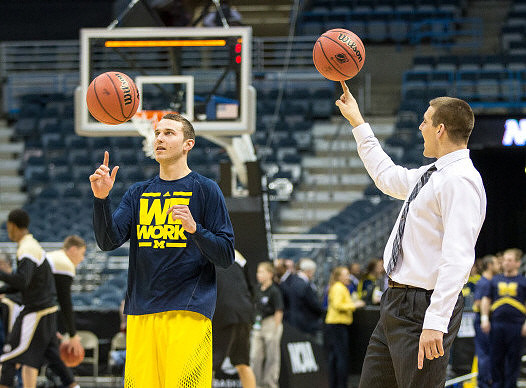 Nik Stauskas (11) and Mitch McGary (4)