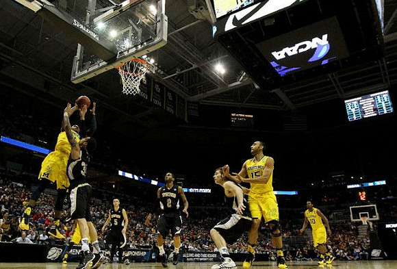 Glenn Robinson III (1), Jon Horford (15), and Derrick Walton Jr. (10)
