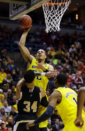 Jordan Morgan (52) and Glenn Robinson III (1)