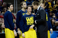 Sean Lonergan (20), Mark Donnal (34), Andrew Dakich (5), Mitch McGary (4), and Max Bielfeldt (44)