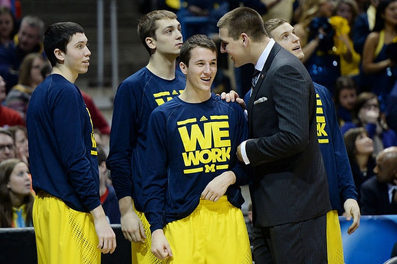 Sean Lonergan (20), Mark Donnal (34), Andrew Dakich (5), Mitch McGary (4), and Max Bielfeldt (44)