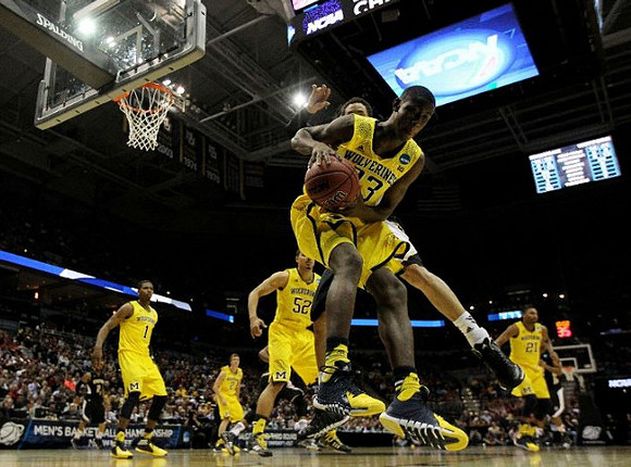 Glenn Robinson III (1), Jordan Morgan (52), Spike Albrecht (2), Zak Irvin (21), and Caris LeVert (23)