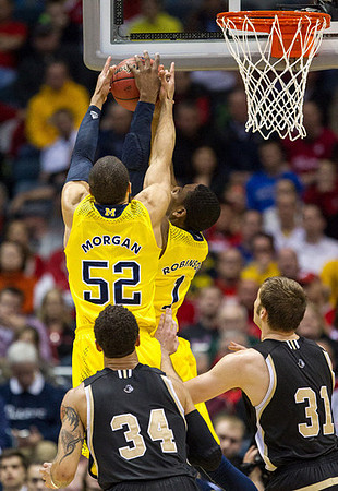 Jordan Morgan (52) and Glenn Robinson III (1)