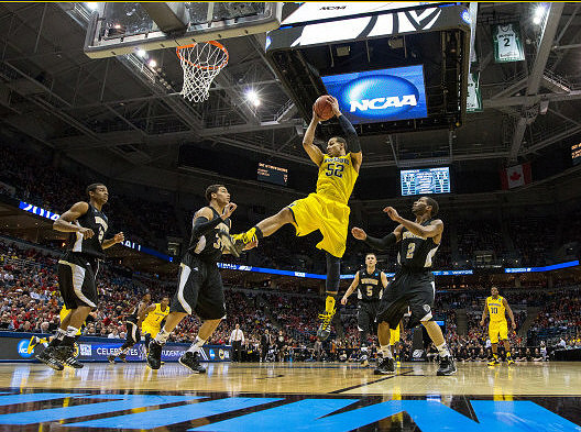 Jordan Morgan (52), Glenn Robinson III (1), and Derrick Walton Jr. (10)