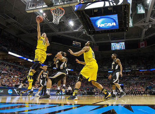 Nik Stauskas (11) and Jon Horford (15)