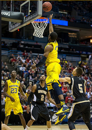 Caris LeVert (23) and Glenn Robinson III (1)