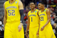 Jordan Morgan (52), Glenn Robinson III (1), and Zak Irvin (21)