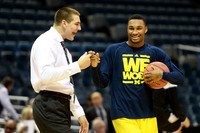 Mitch McGary (4) and Zak Irvin (21)