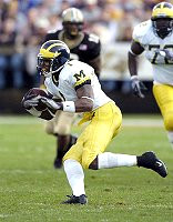 Braylon Edwards (1) and Rueben Riley (72)