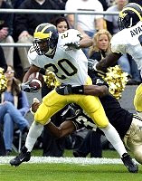 Michael Hart (20) and Jason Avant (8)