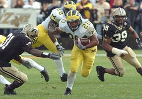 Michael Hart (20) and Tim Massaquoi (88)