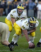 David Baas (75) and Chad Henne (7)