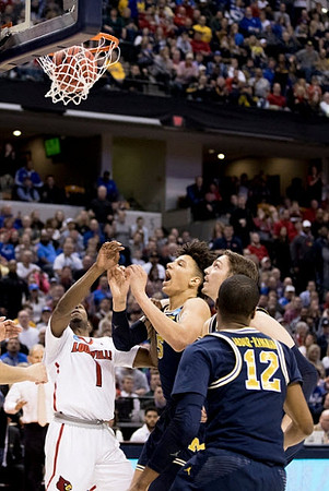 D.J. Wilson (5) and Muhammad-Ali Abdur-Rahkman (12)