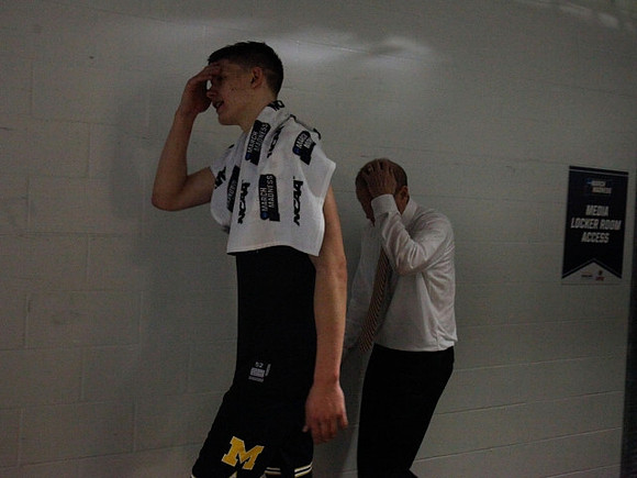 Moritz Wagner (13) and John Beilein
