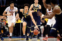 D.J. Wilson (5) and Mark Donnal (34)