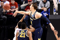 Zak Irvin (21) and Mark Donnal (34)