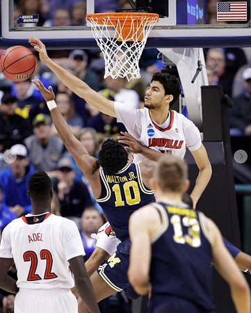 Derrick Walton Jr. (10) and Moritz Wagner (13)