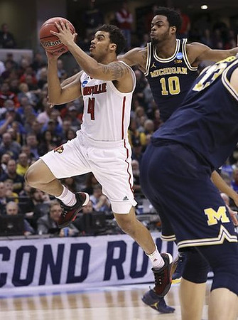 Derrick Walton Jr. (10) and Moritz Wagner (13)