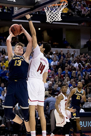 Moritz Wagner (13) and Zak Irvin (21)