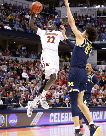 D.J. Wilson (5) and Muhammad-Ali Abdur-Rahkman (12)