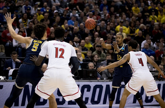 D.J. Wilson (5) and Muhammad-Ali Abdur-Rahkman (12)
