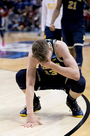 Moritz Wagner (13) and Zak Irvin (21)