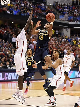 Muhammad-Ali Abdur-Rahkman (12) and Derrick Walton Jr. (10)