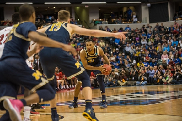 Muhammad-Ali Abdur-Rahkman (12), Moritz Wagner (13), and Zak Irvin (21)