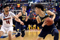 Moritz Wagner (13) and D.J. Wilson (5)