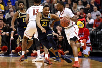 Derrick Walton Jr. (10) and Zak Irvin (21)