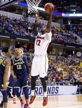 Derrick Walton Jr. (10), Muhammad-Ali Abdur-Rahkman (12), and Moritz Wagner (13)