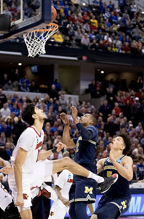 Muhammad-Ali Abdur-Rahkman (12) and D.J. Wilson (5)