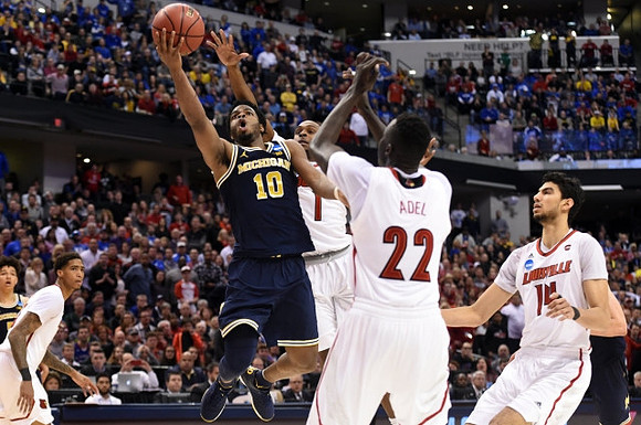 Derrick Walton Jr. (10) and D.J. Wilson (5)