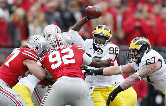 Devin Gardner (98) and Kyle Kalis (67)