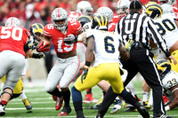 Raymon Taylor (6), Bryan Mone (90), and Taco Charlton (33)
