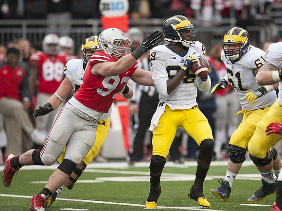 Devin Gardner (98) and Graham Glasgow (61)