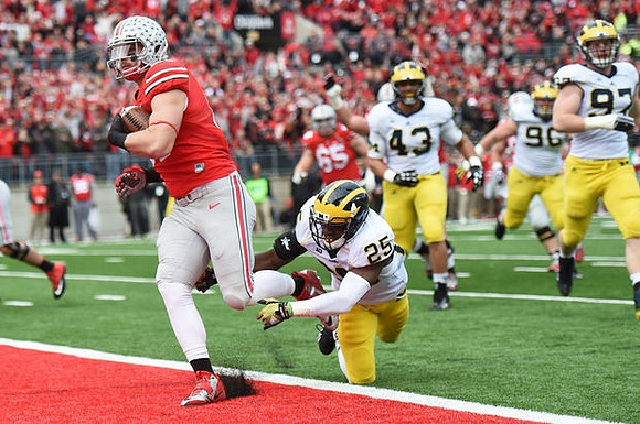 Dymonte Thomas (25), Scott Sypniewski (43), Ryan Glasgow (96), and Brennen Beyer (97)