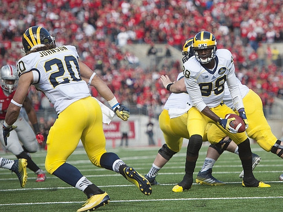 Drake Johnson (20) and Devin Gardner (98)