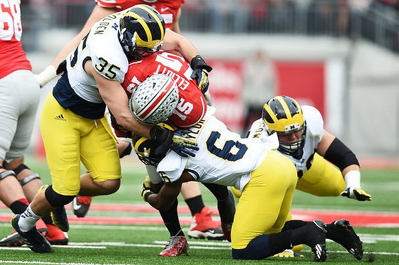 Joe Bolden (35), Raymon Taylor (6), and Ryan Glasgow (96)