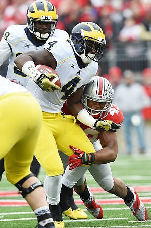De'Veon Smith (4) and Devin Gardner (98)