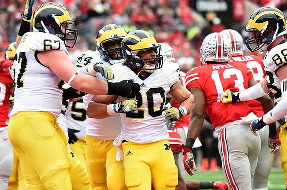 Kyle Kalis (67), A.J. Williams (84),  Drake Johnson (20), and Jake Butt (88)