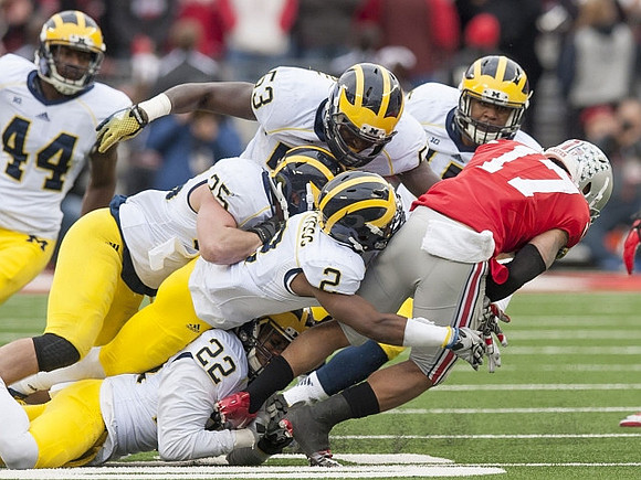 Delano Hill (44), Joe Bolden (35), Jarrod Wilson (22), and Blake Countess (2)