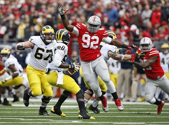 Kyle Kalis (67) and Devin Gardner (98)