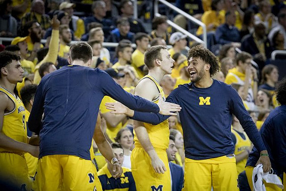 Adrien Nunez (5), Colin Castleton (11), Austin Davis (51), and Isaiah Livers (4)